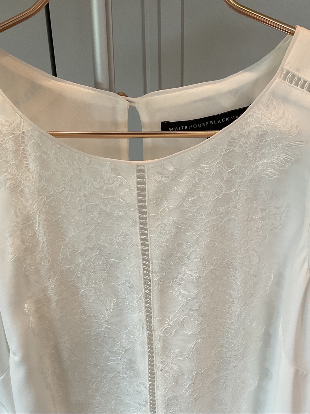 White House Black Market Ivory Lace-Front Blouse.